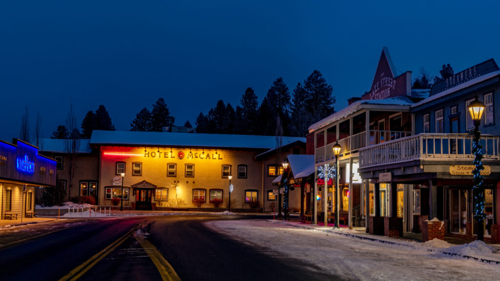 McCall, Idaho, USA –November 28, 2020: McCall hotel and main street at night with snow on the ground