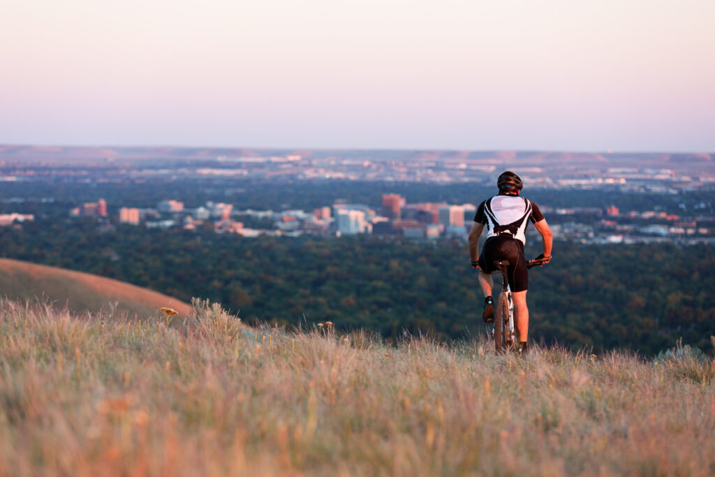 Man on mountain bike riding in the foothills [url=http://www.istockphoto.com/search/lightbox/12793767]  [img]http://www.mieahmt.com/istock/banner/bike.jpg[/img][/url]