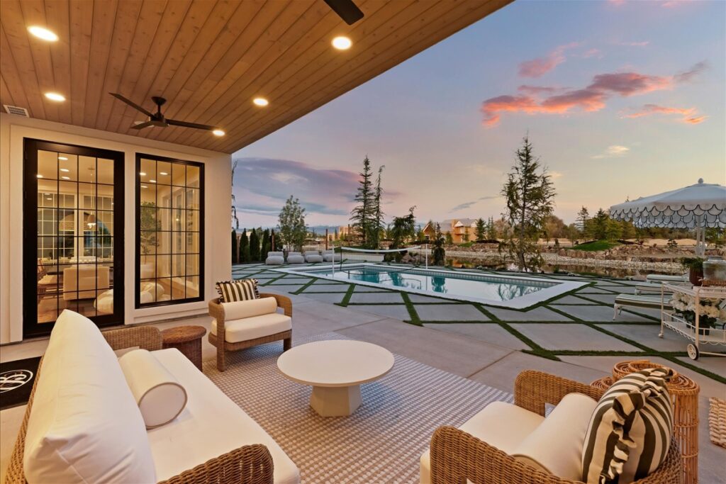 Back porch in Biltmore Co.'s 2026 Spring Parade home The Alexandria with view of the pool.