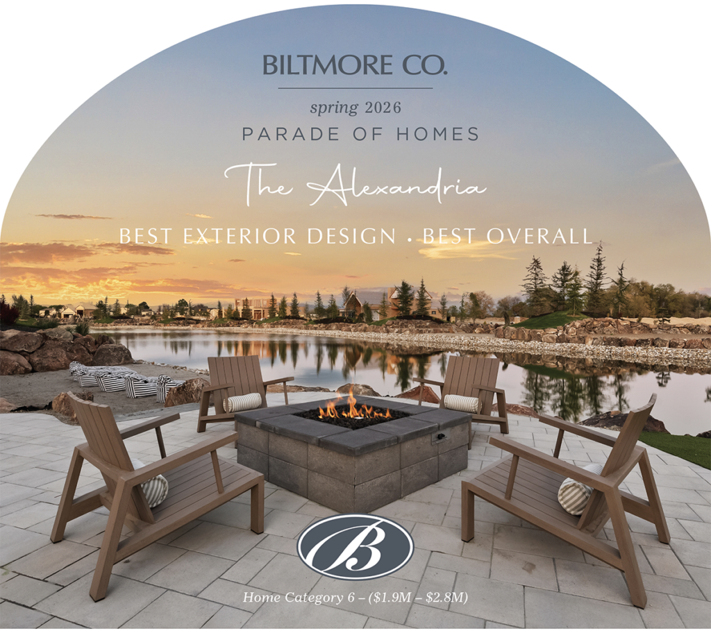 paved patio deck with chairs around a fire pit in front of a lake with text saying Biltmore Co. Spring 2026 Parade of Homes The Alexandria and calling out the awards that it has won. Best Exterior Design and Best Overall.